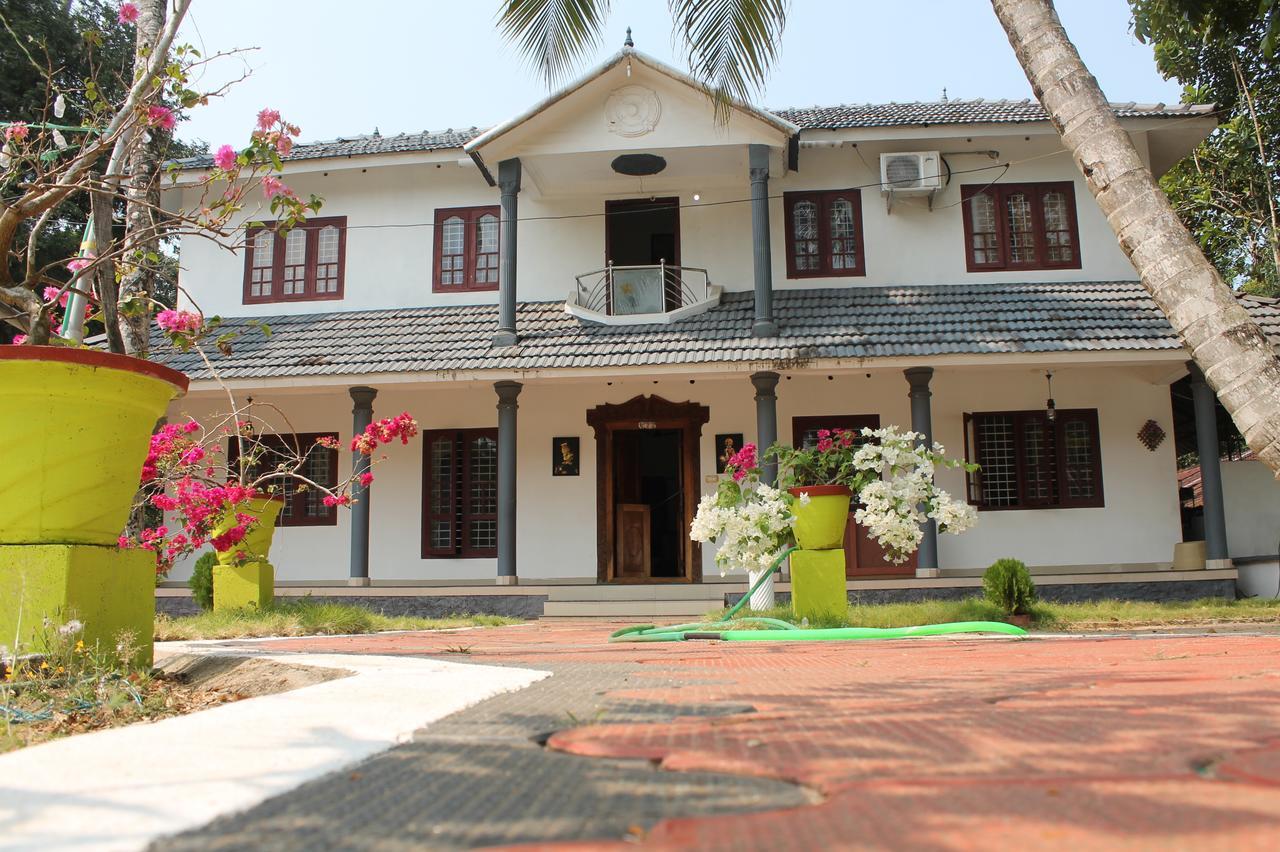 Апартаменти Marari Peterland Alappuzha Номер фото